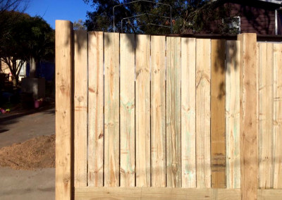 Vertical Timber Panels with Timber Feature Columns and an Automated Electric Sliding Gate and Hinged Access Gate