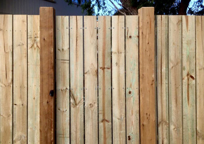 Vertical Timber Panels with Timber Feature Columns and an Automated Electric Sliding Gate and Hinged Access Gate