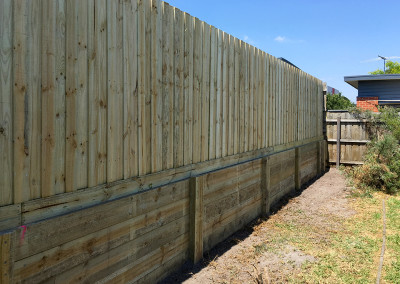 Timber Boundry Fence on Retaining Wall
