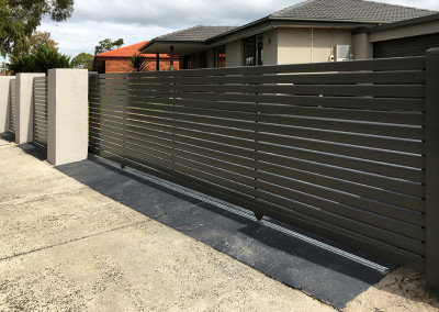 Steel Fence with Rendered Colums and Automated Electric Sliding Gate