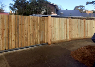 Vertical Timber Panels with Timber Feature Columns and an Automated Electric Sliding Gate